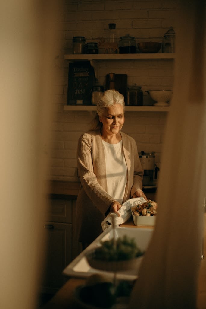 Selective Focus Photography of Standing Woman Beside Table